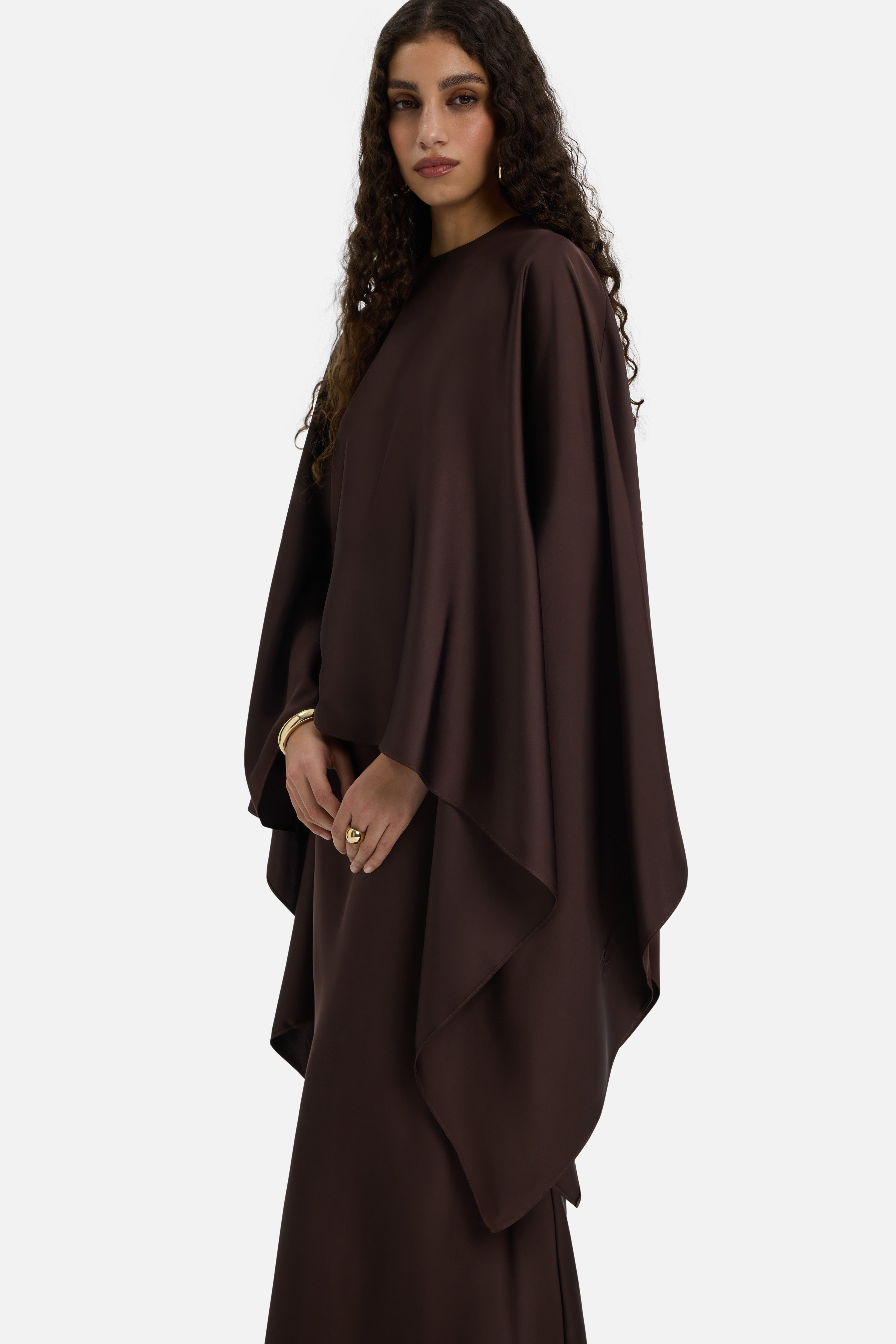 Close up side view of dark brown blouse