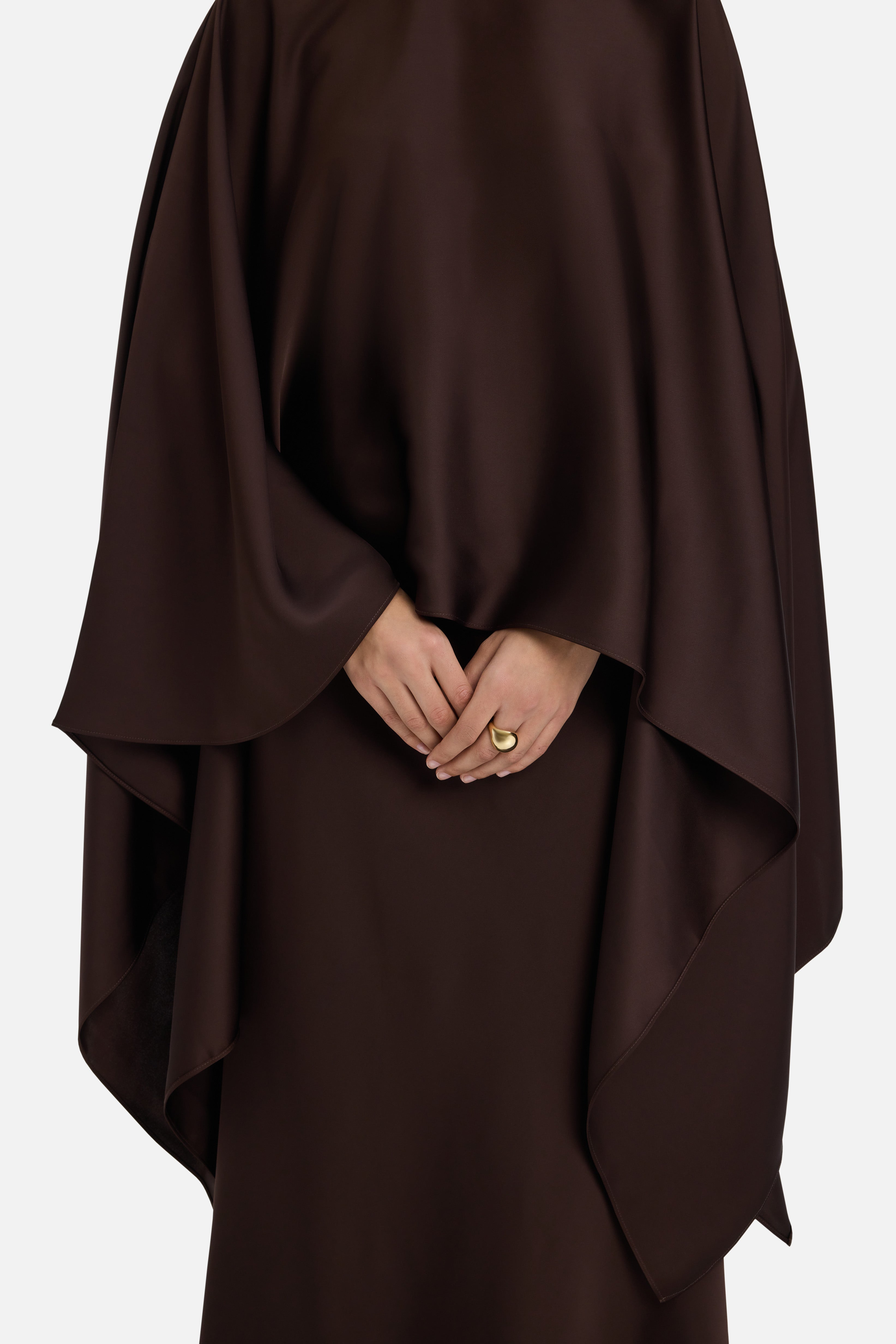 Close up of asymmetric dark brown blouse