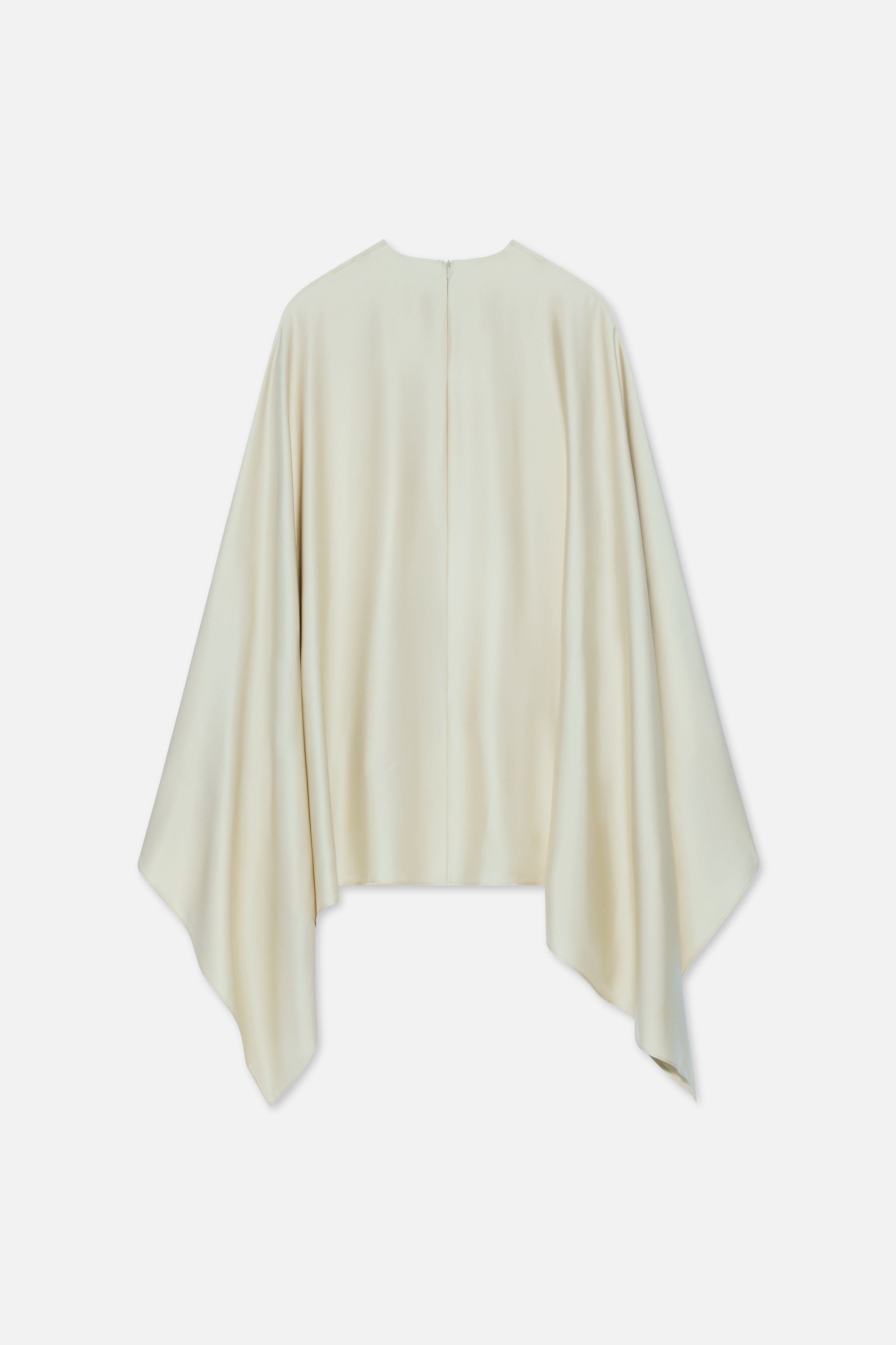 Flat lay back off white blouse