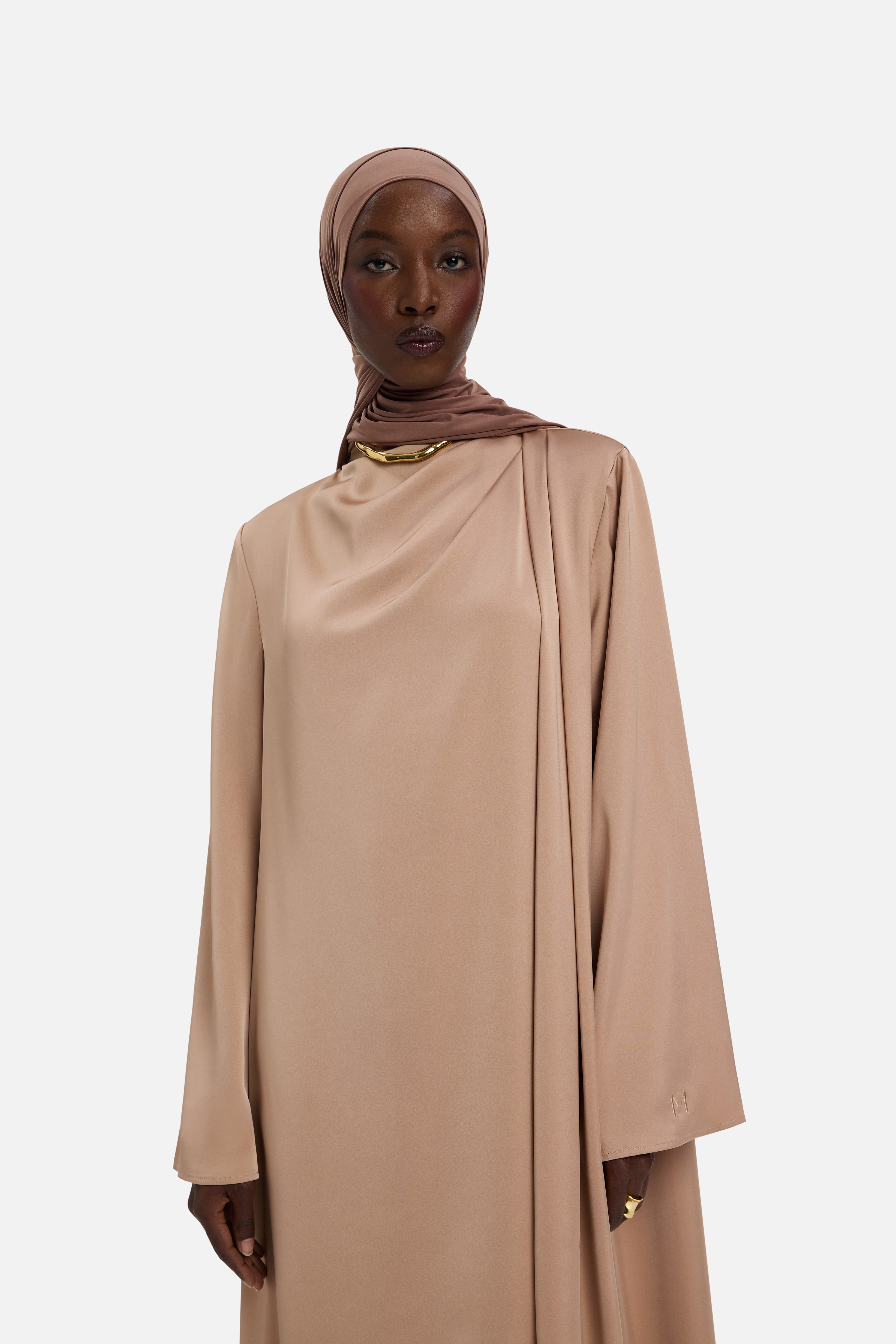 Cropped front view model wearing light brown dress