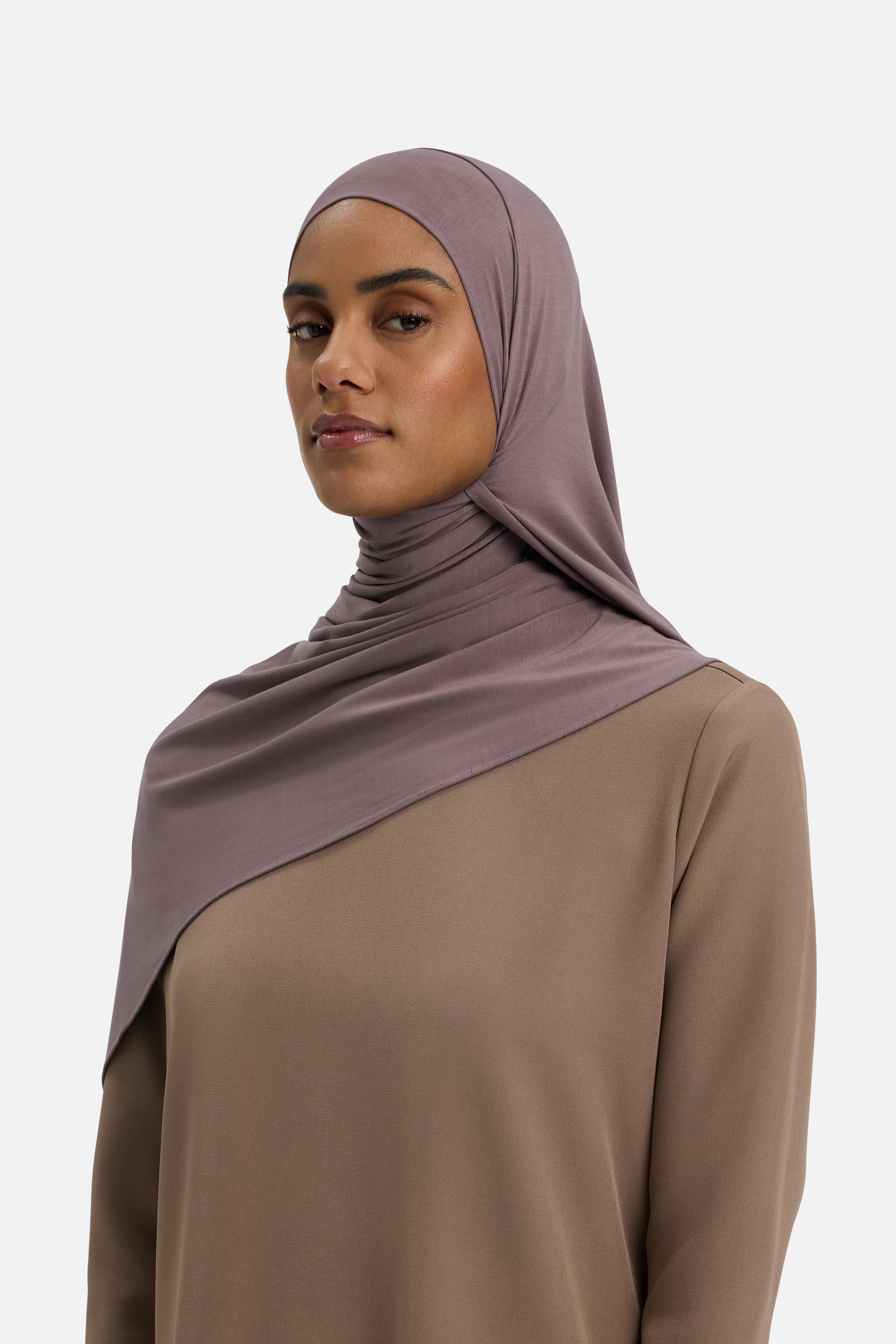 Model wearing purple MERRACHI headscarf, side view