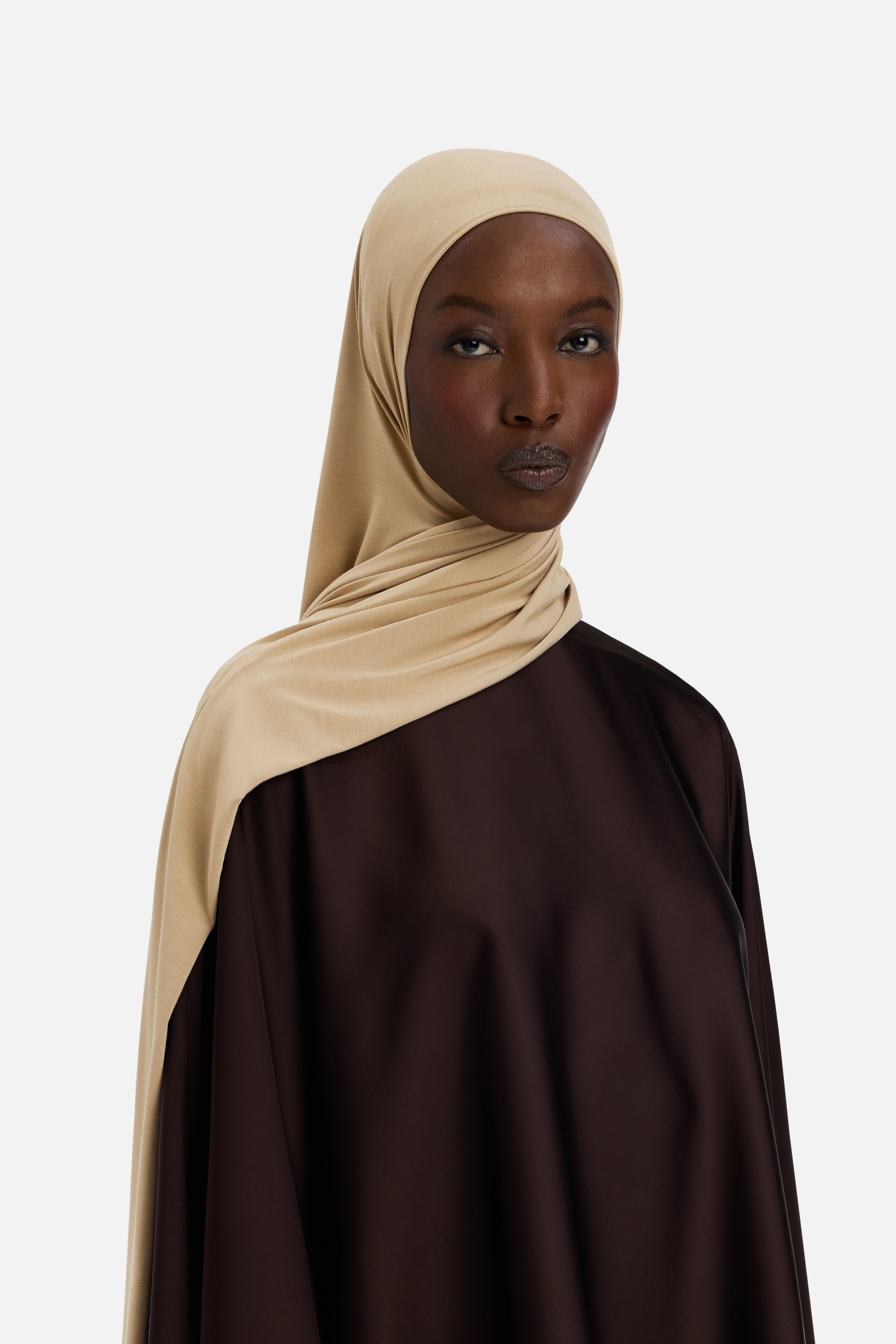 Model wearing yellow MERRACHI headscarf, side view