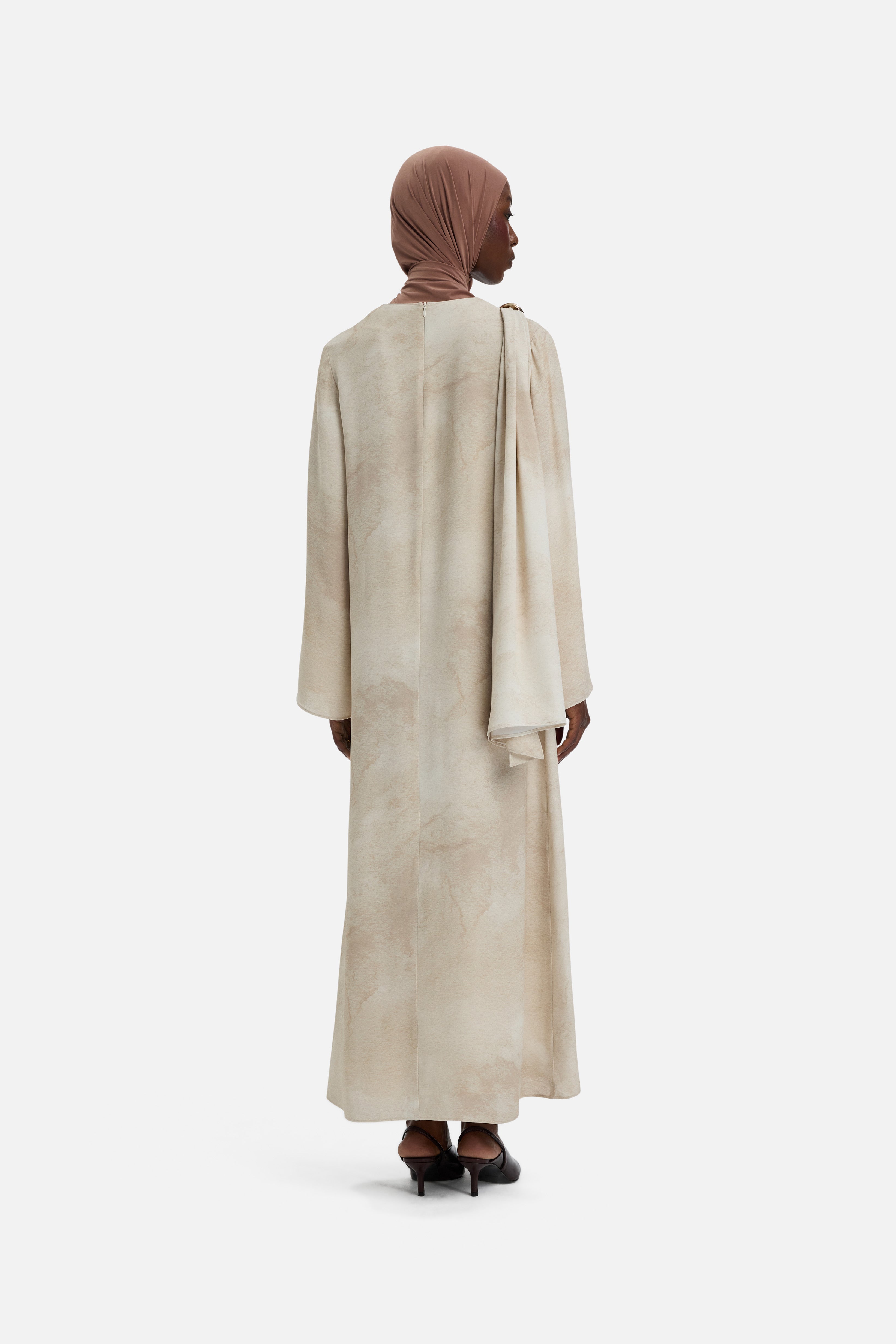 Back view model wearing off white dress marble print