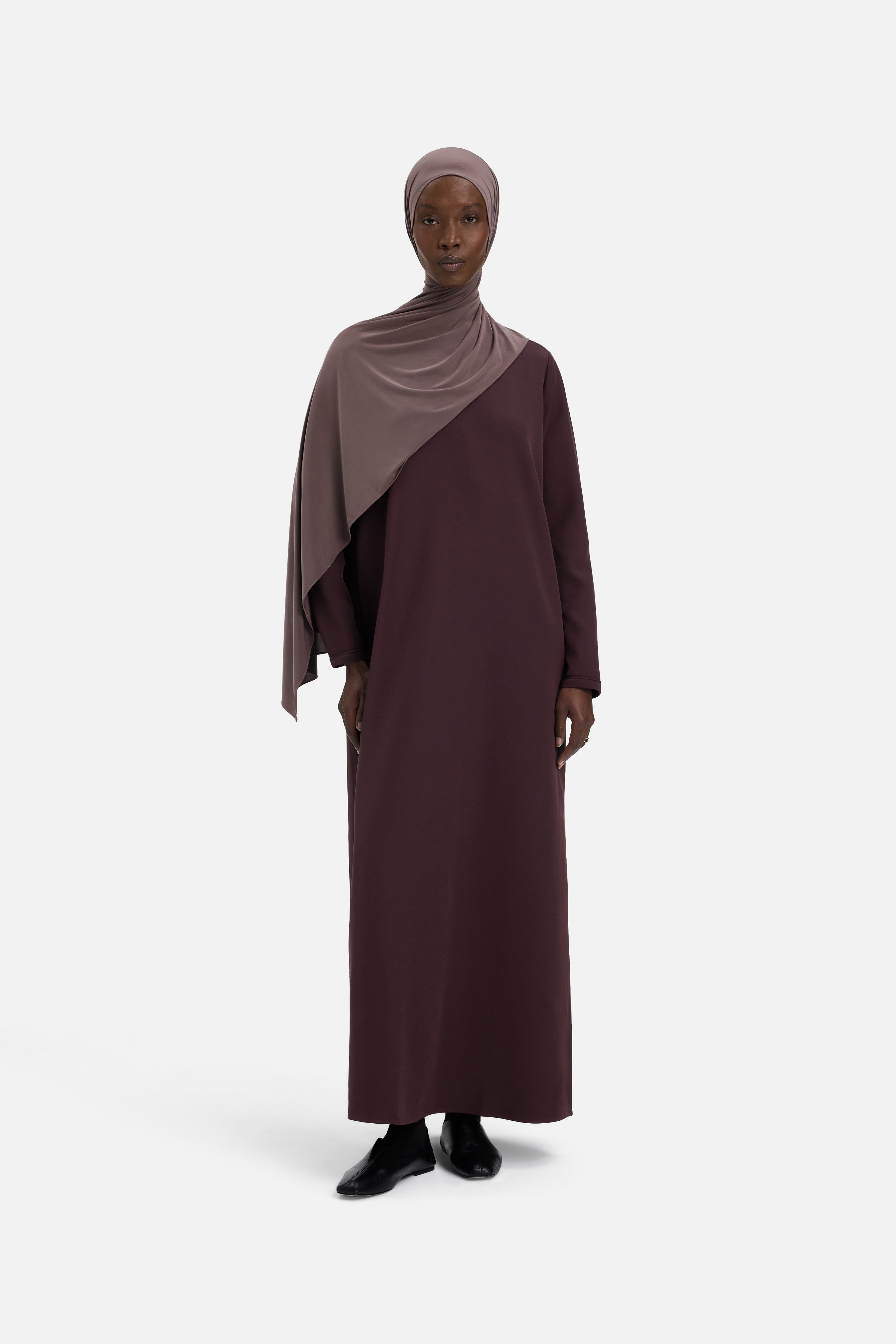 Front view model wearing purple dress and headscarf