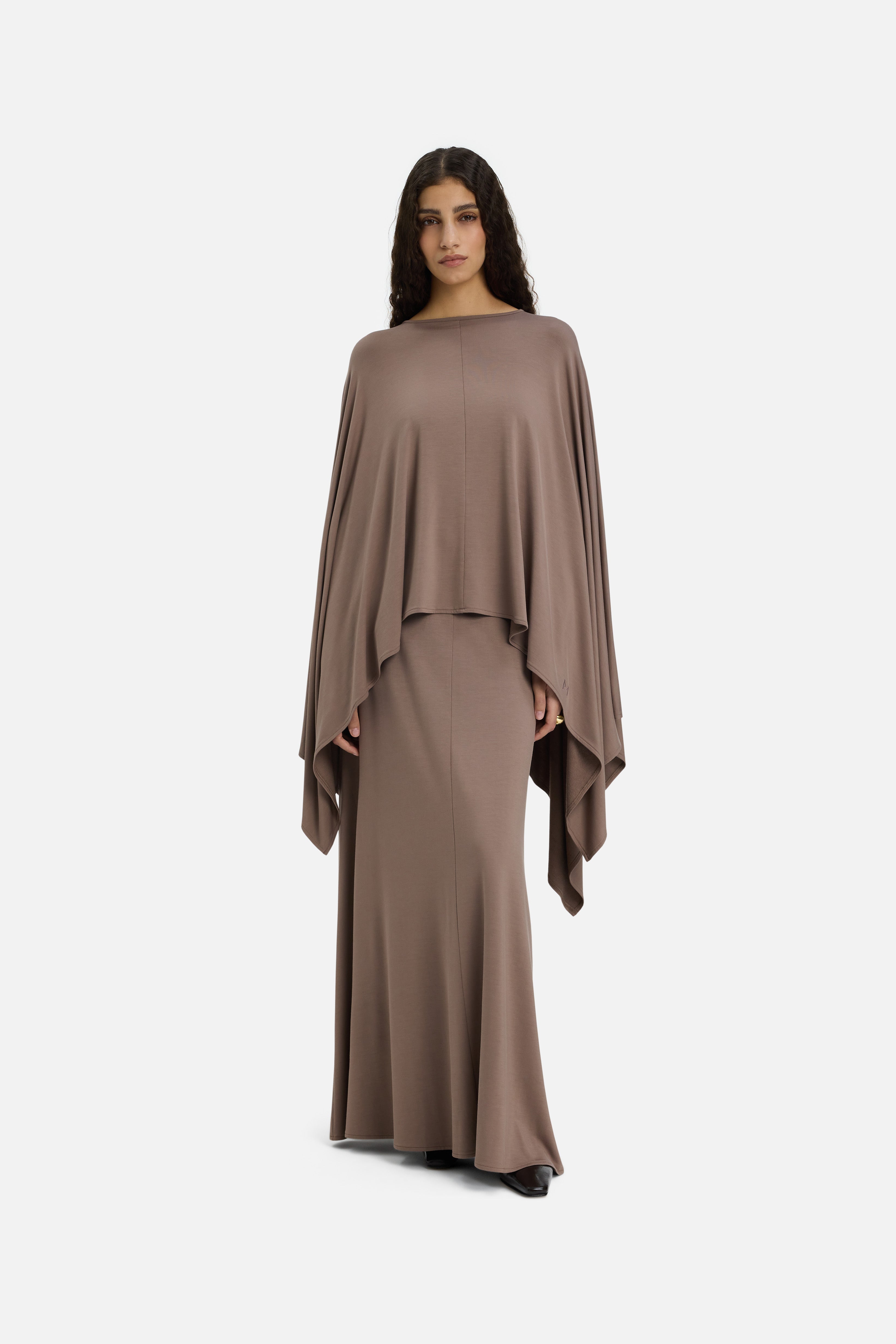 Front view model wearing taupe maxi skirt