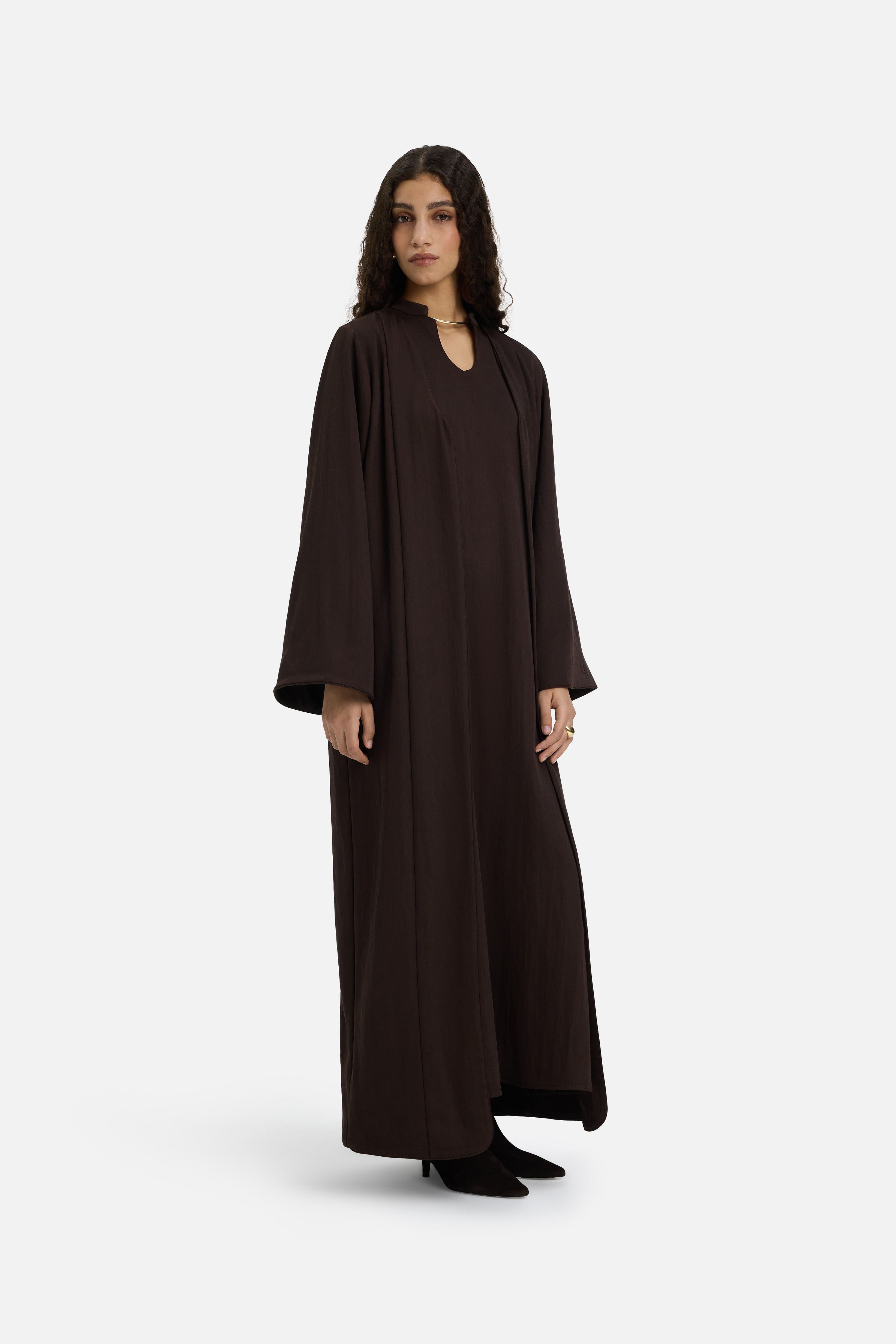 Side view model wearing dark brown abaya