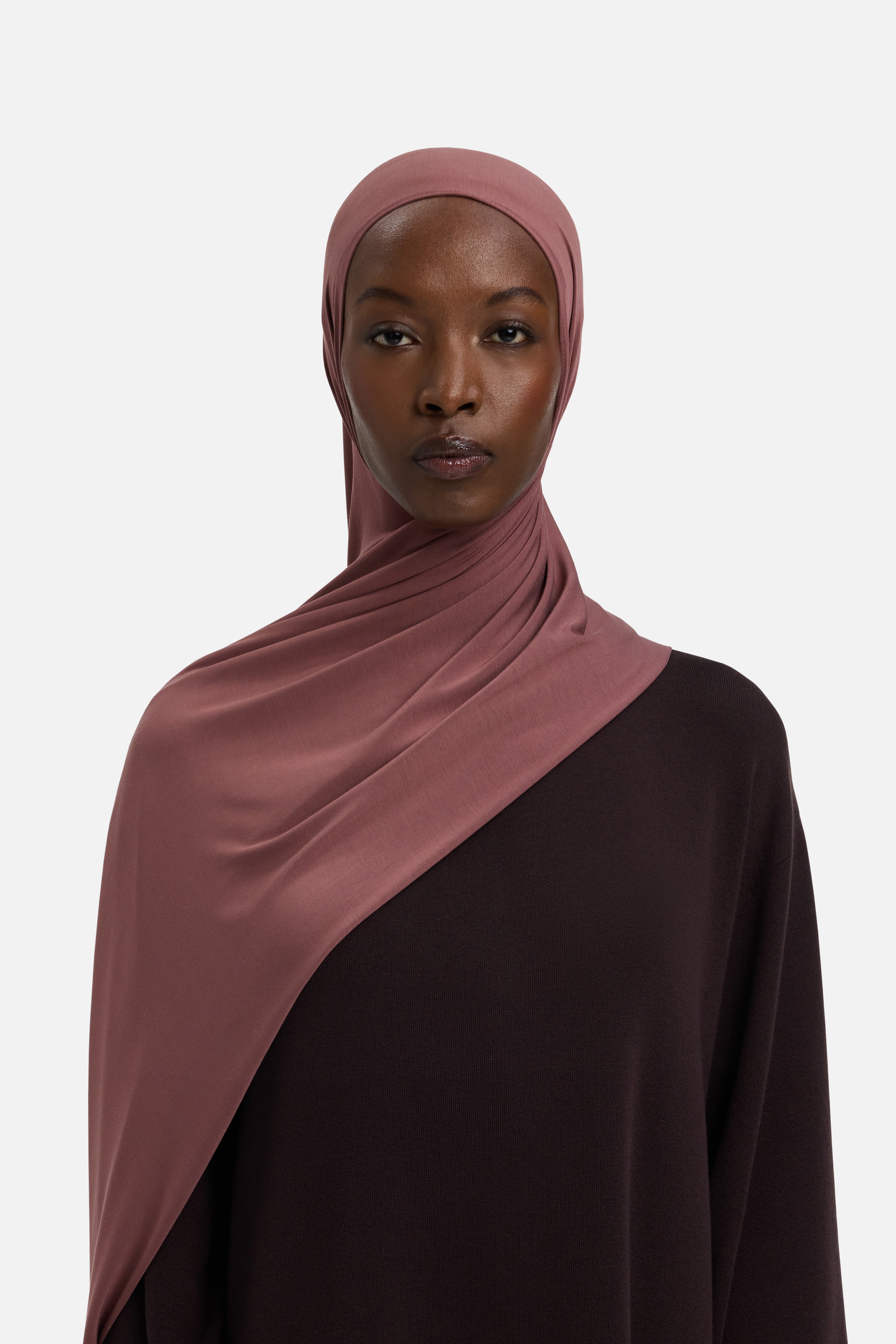 Model wearing red MERRACHI headscarf, front view