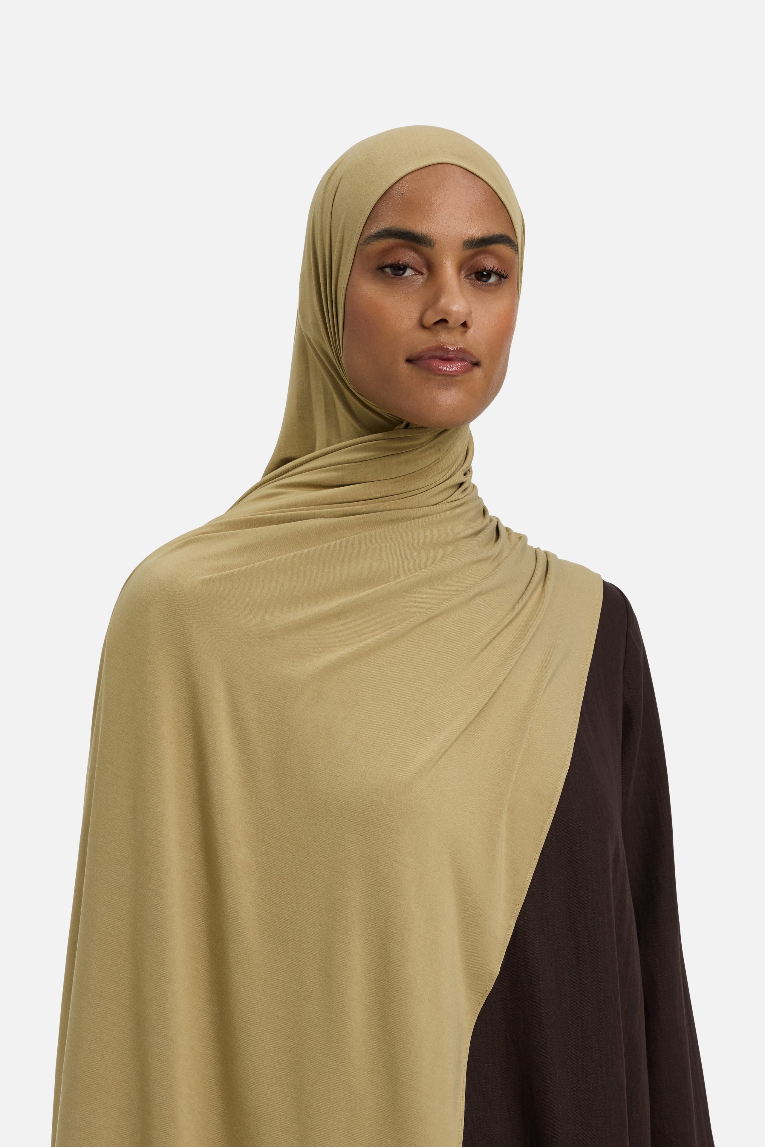 Model wearing light brown MERRACHI headscarf, front view