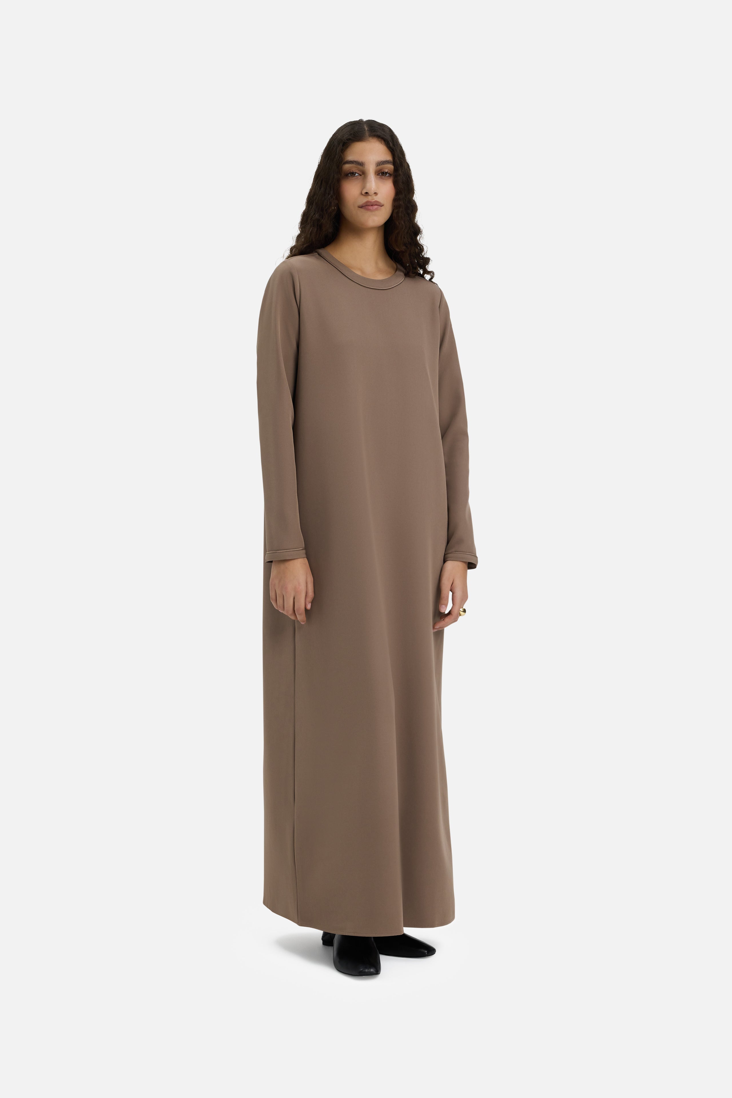 Front view model wearing taupe dress
