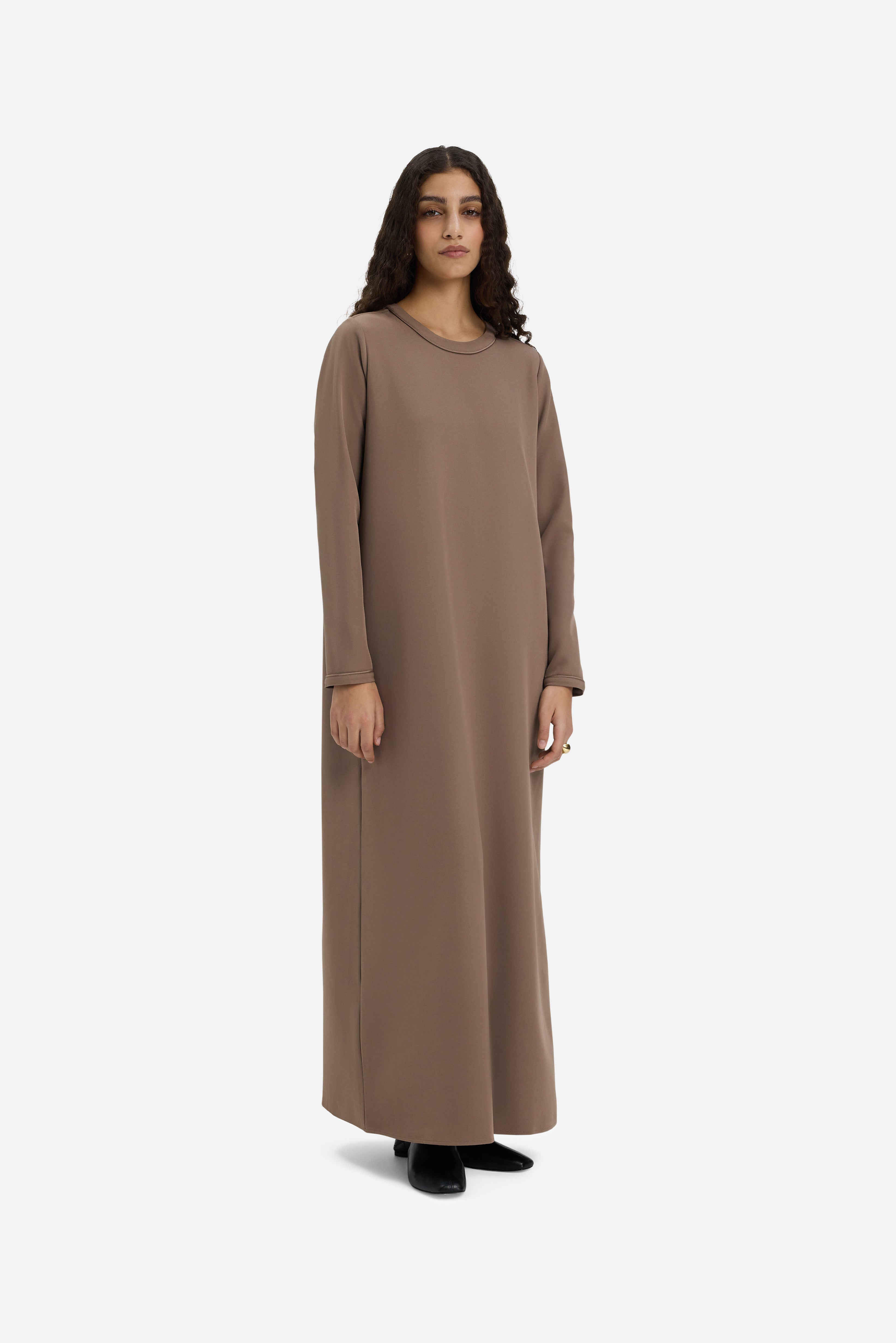 Side view model wearing long taupe dress