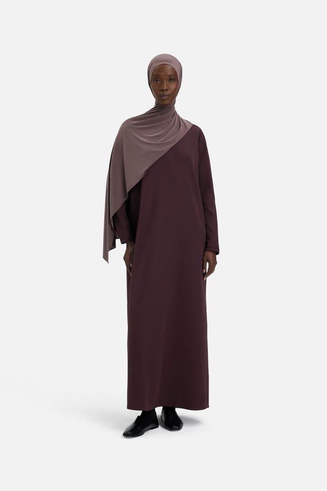 Front view model wearing purple dress and headscarf