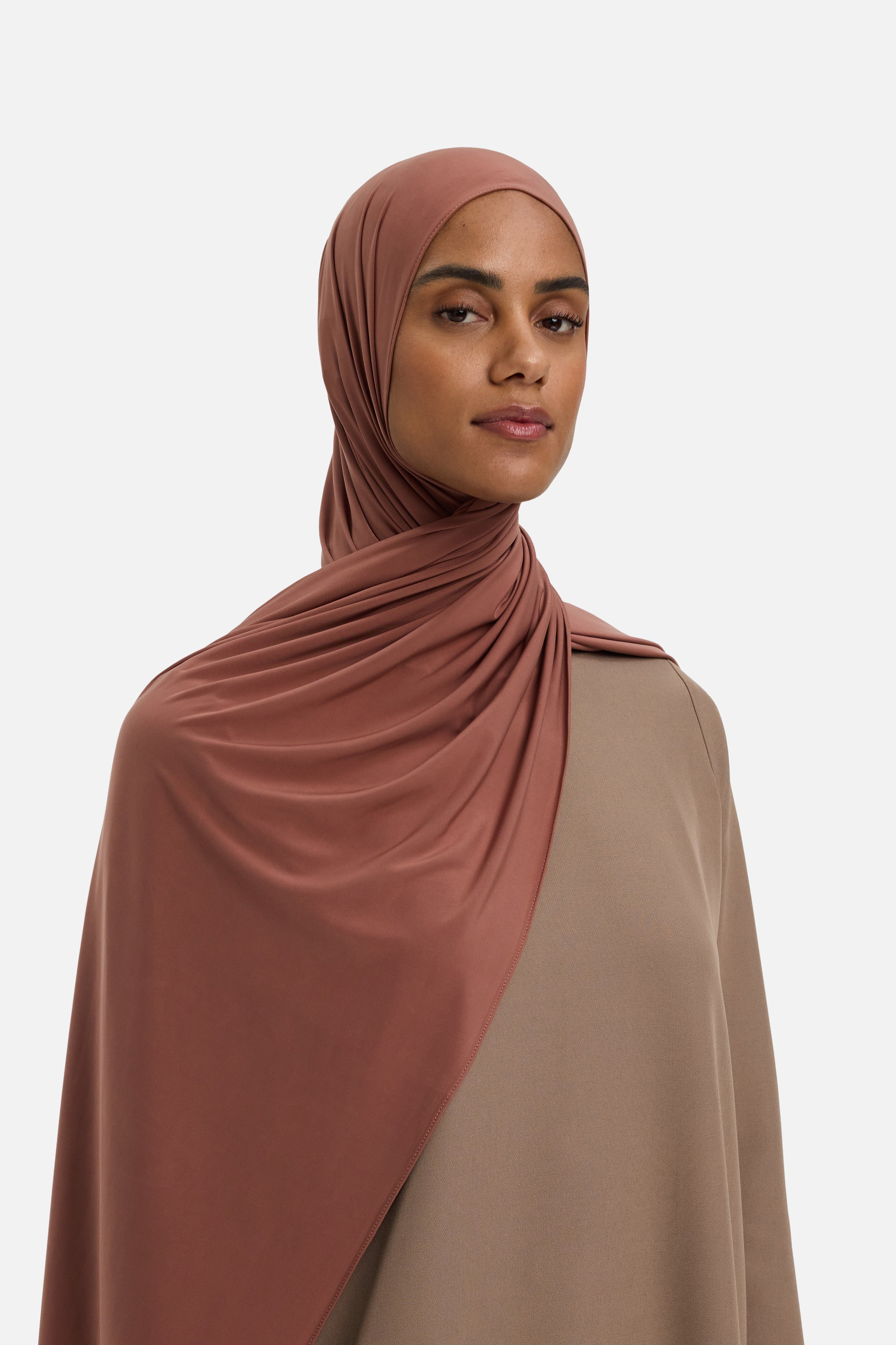 Model wearing brown MERRACHI headscarf, front view